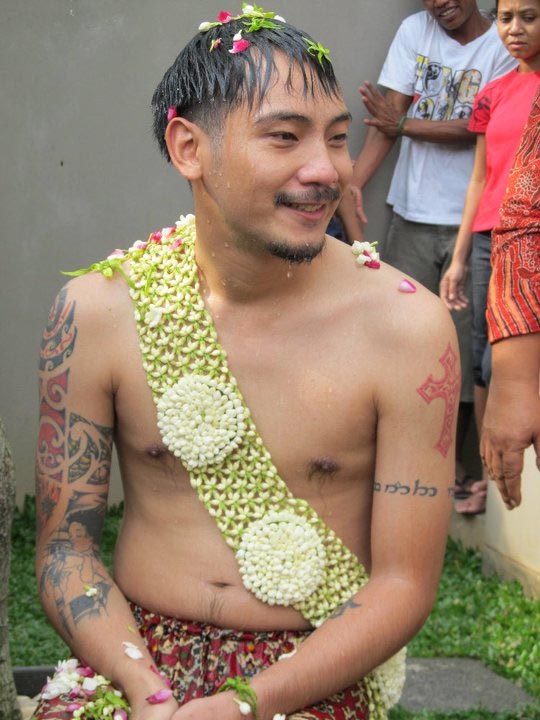 Charles getting bathed in flowers 2